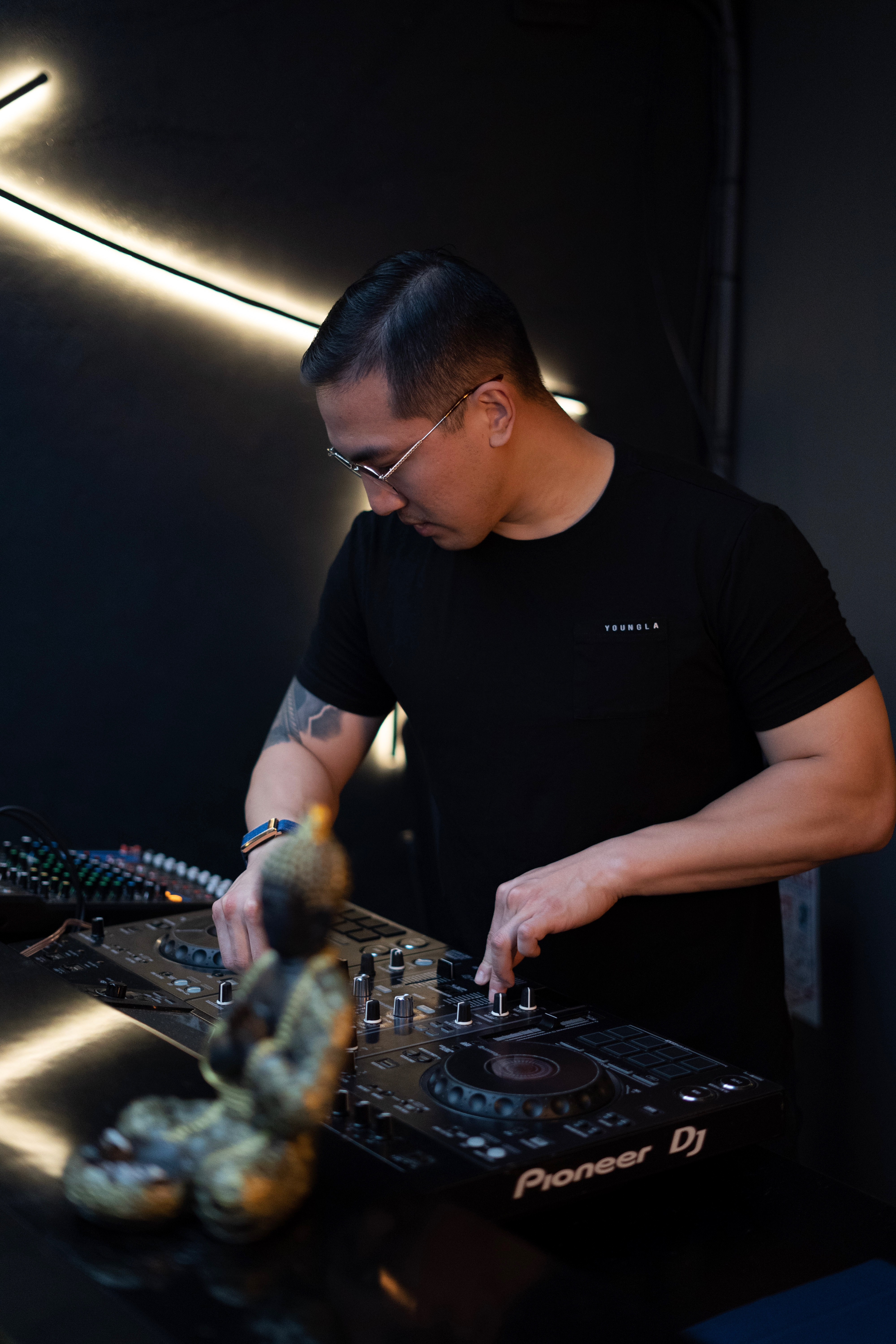 Sean Chi on the mic in the booth